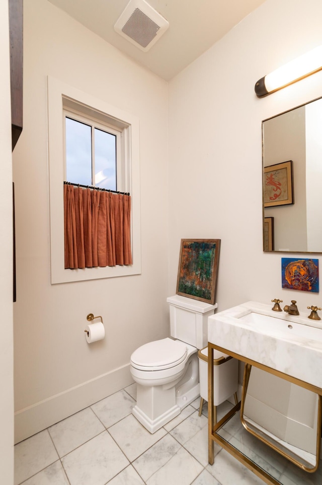 1646 Marsh Harbor Ln, Mount Pleasant, SC 29464 - half bath featuring toilet and baseboards