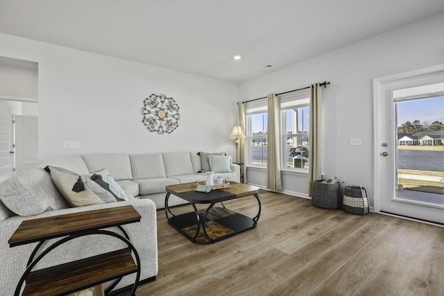 living room featuring light wood-type flooring