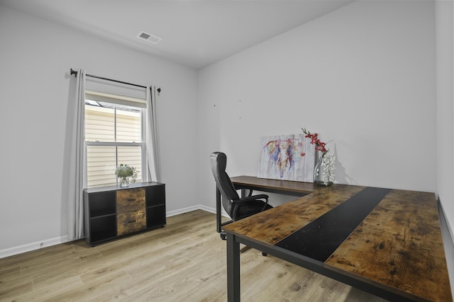 home office featuring light hardwood / wood-style flooring