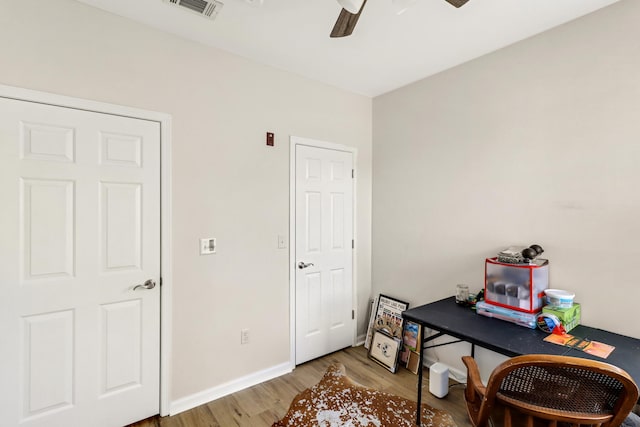 office area featuring wood-type flooring and ceiling fan