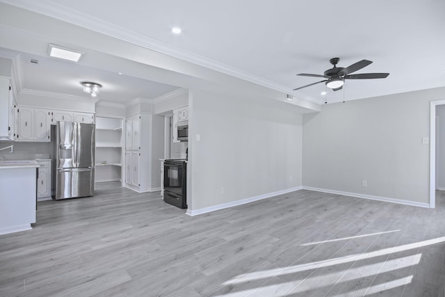 unfurnished living room with crown molding, ceiling fan, sink, and light hardwood / wood-style floors