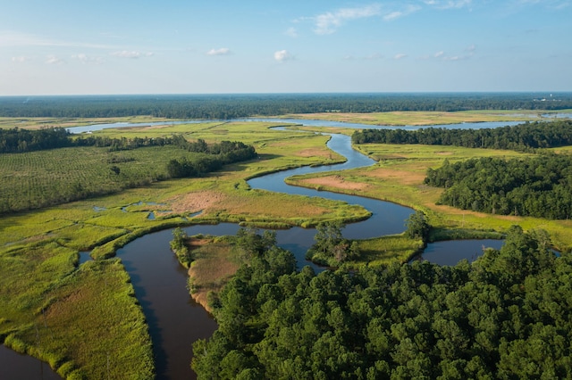 birds eye view of property with a water view and a rural view