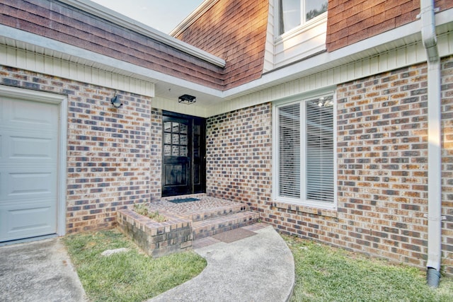 entrance to property with a garage