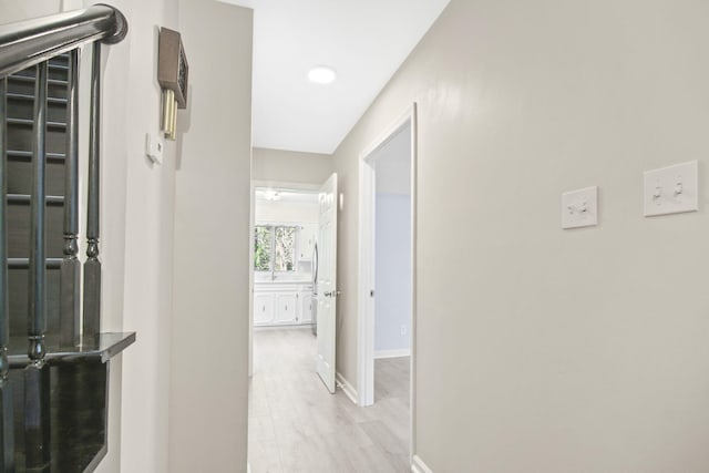 corridor featuring light hardwood / wood-style flooring