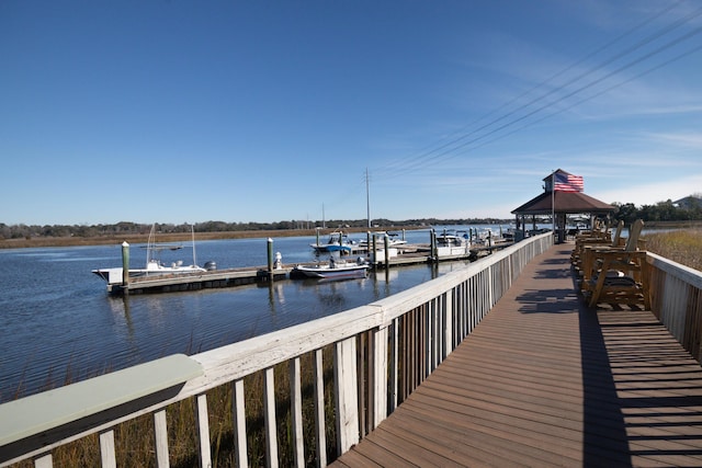 dock area with a water view and a gazebo