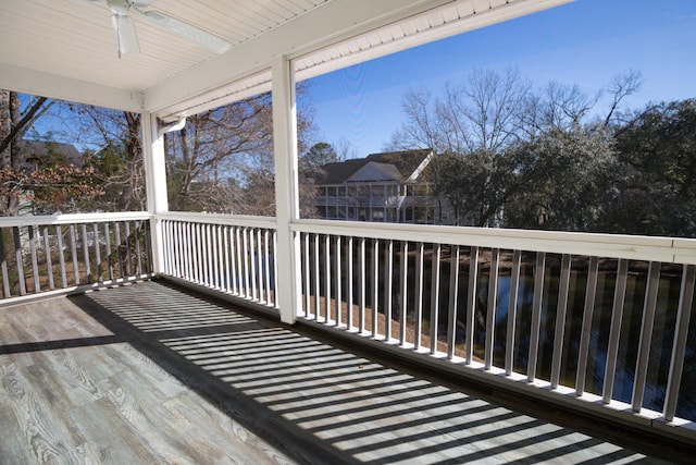 wooden terrace with ceiling fan