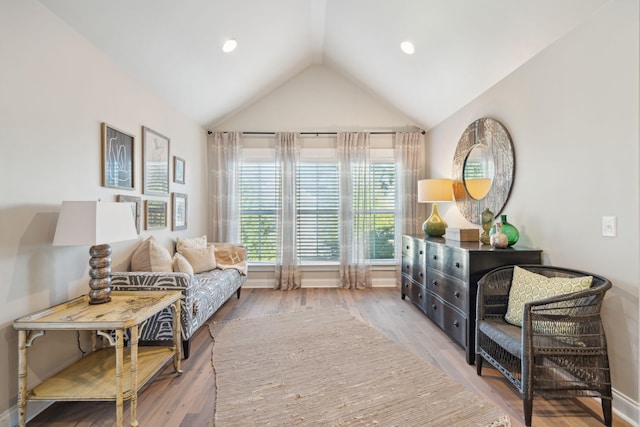 sitting room featuring recessed lighting, baseboards, lofted ceiling, and wood finished floors