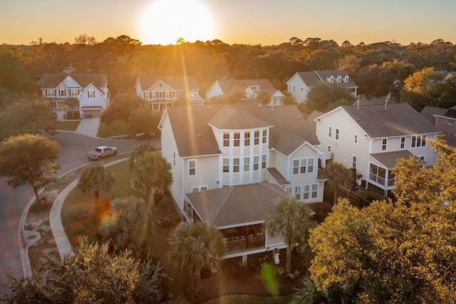 aerial view at dusk with a residential view