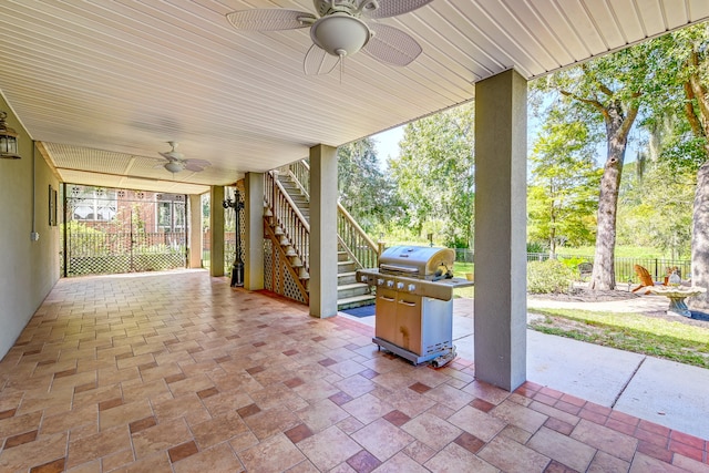 view of patio with grilling area and ceiling fan