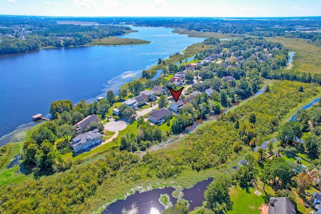 drone / aerial view with a water view