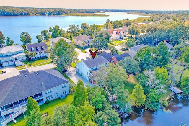 aerial view at dusk with a water view