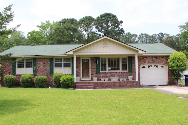 2163 Pinehurst Ave, Charleston, SC 29414 - single story home featuring a garage, a front lawn, driveway, and brick siding