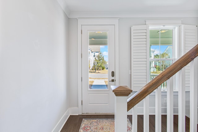 entryway featuring stairs, dark wood finished floors, and baseboards