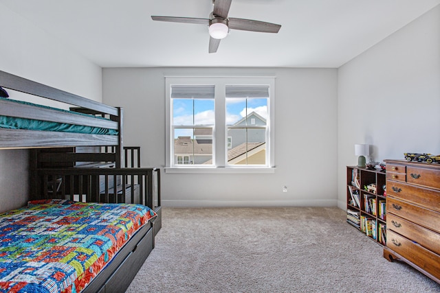 bedroom with ceiling fan and carpet flooring