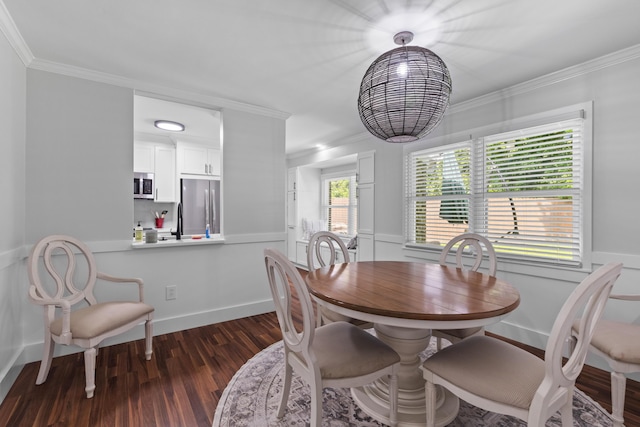 1990 Butternut St, Charleston, SC 29414 - dining space with ornamental molding, wainscoting, and dark wood finished floors