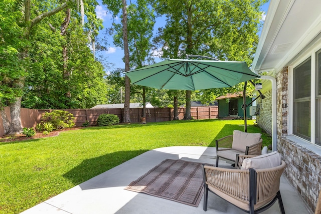 1990 Butternut St, Charleston, SC 29414 - fenced backyard with a patio