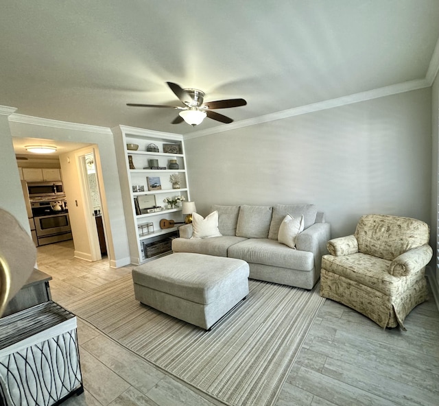 living room with light wood-type flooring, ceiling fan, and ornamental molding