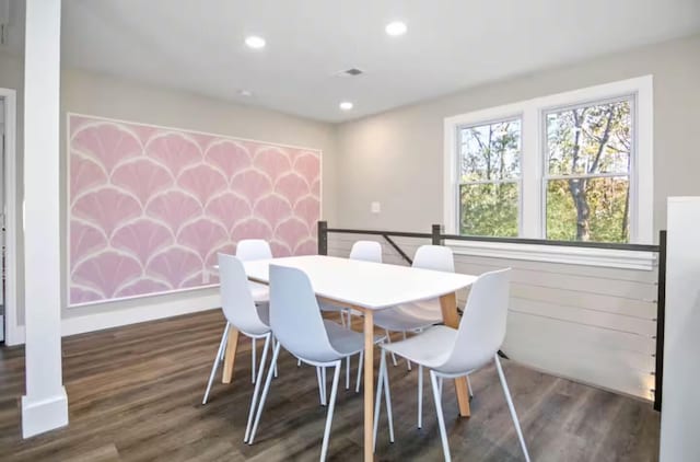 dining space featuring dark wood-type flooring