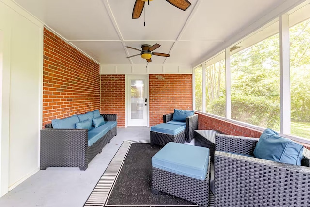 sunroom / solarium with ceiling fan and a healthy amount of sunlight