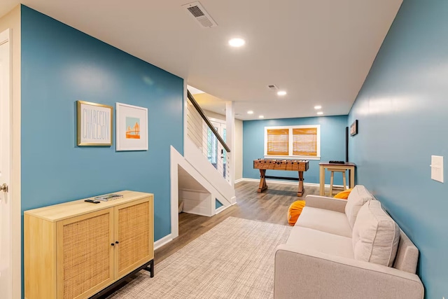 playroom with light hardwood / wood-style flooring