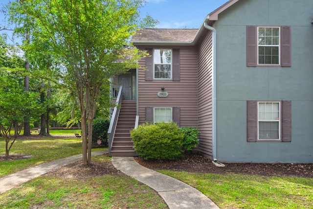 7921 Cricket Ct Unit 305E, North Charleston, SC 29418 - view of front of house featuring a front lawn and stairway