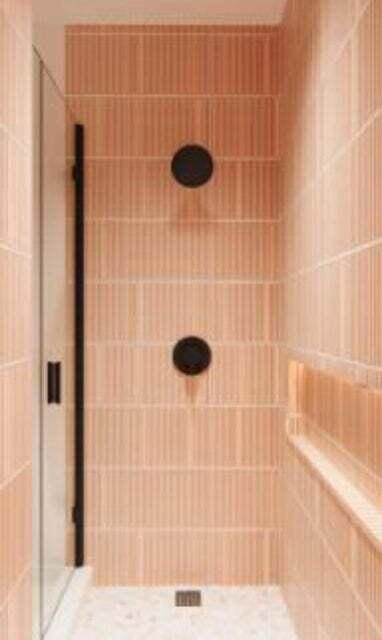 bathroom with tiled shower