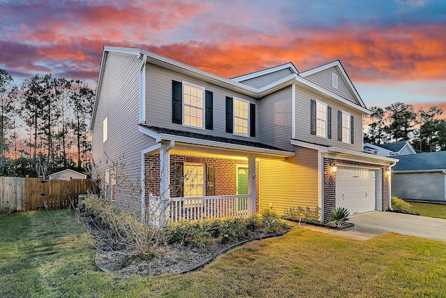 319 Deep River Rd, Summerville, SC 29486 - view of front of house with covered porch, a garage, and a lawn