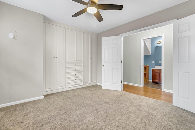 319 Deep River Rd, Summerville, SC 29486 - unfurnished bedroom featuring connected bathroom, ceiling fan, a closet, and carpet