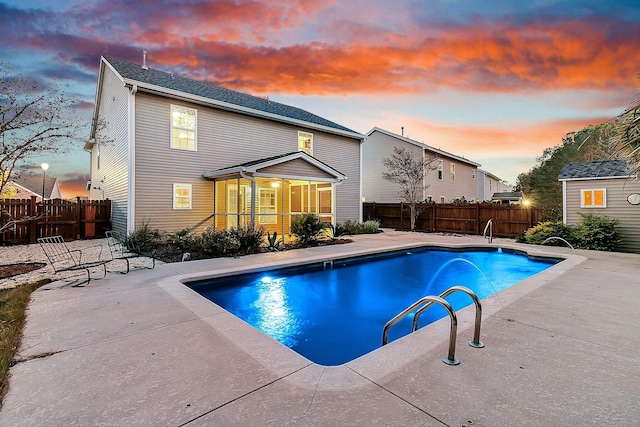 319 Deep River Rd, Summerville, SC 29486 - pool at dusk with a patio and a sunroom