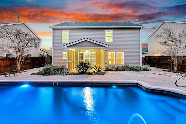 319 Deep River Rd, Summerville, SC 29486 - pool at dusk featuring a sunroom