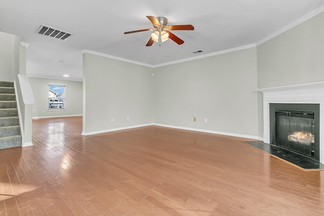 319 Deep River Rd, Summerville, SC 29486 - unfurnished living room with ceiling fan, ornamental molding, and light wood-type flooring