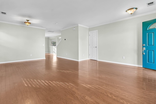319 Deep River Rd, Summerville, SC 29486 - unfurnished living room featuring crown molding and wood-type flooring