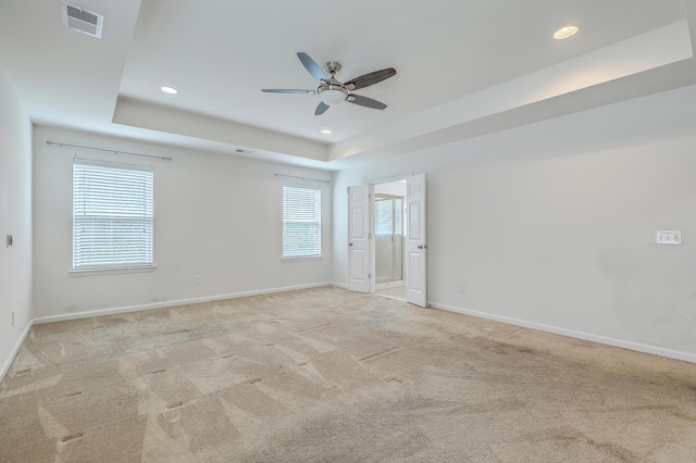 1350 Wild Goose Trl, Summerville, SC 29483 - unfurnished room featuring a tray ceiling, ceiling fan, recessed lighting, plenty of natural light, and light colored carpet