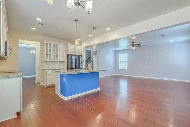 1350 Wild Goose Trl, Summerville, SC 29483 - kitchen featuring appliances with stainless steel finishes, a chandelier, white cabinets, dark wood-style floors, and recessed lighting