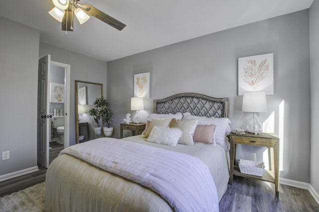 bedroom featuring ceiling fan, dark wood-type flooring, and ensuite bathroom