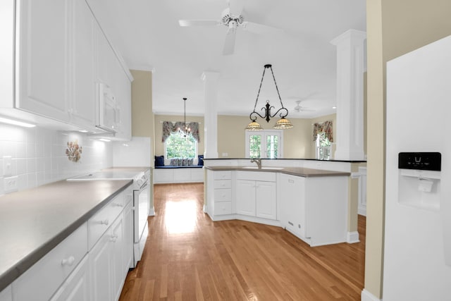 1025 Mathis Ferry Rd, Mount Pleasant, SC 29464 - kitchen featuring white appliances, light wood-type flooring, and white cabinets
