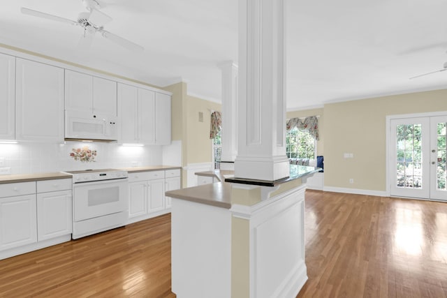 1025 Mathis Ferry Rd, Mount Pleasant, SC 29464 - kitchen featuring white appliances, decorative columns, ceiling fan, light wood-style floors, and crown molding