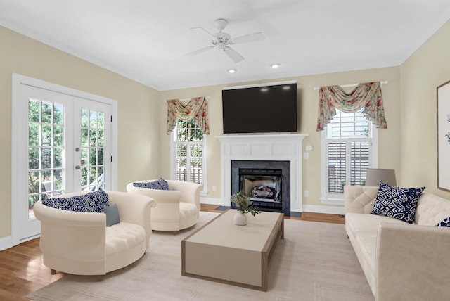 1025 Mathis Ferry Rd, Mount Pleasant, SC 29464 - living area featuring plenty of natural light, light wood-type flooring, a fireplace with flush hearth, and recessed lighting