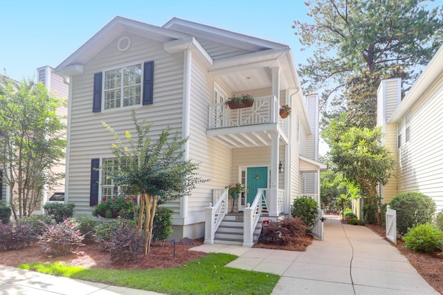 1025 Mathis Ferry Rd, Mount Pleasant, SC 29464 - view of front facade with a balcony and concrete driveway