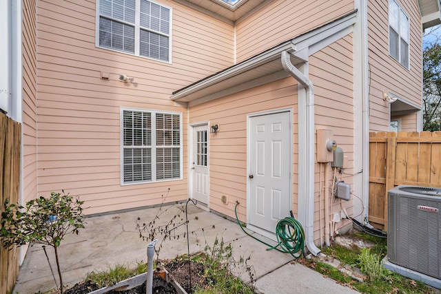 property entrance with central air condition unit