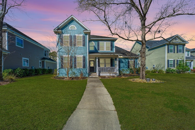 414 Hamlet Cir, Goose Creek, SC 29445 - traditional-style house with covered porch and a front yard