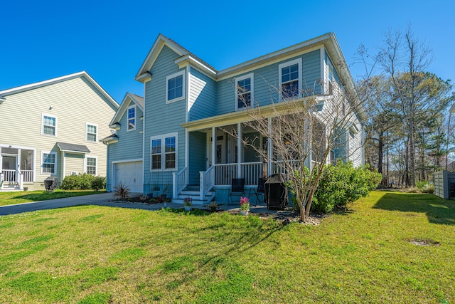 414 Hamlet Cir, Goose Creek, SC 29445 - rear view of property with a porch, asphalt driveway, a garage, and a yard