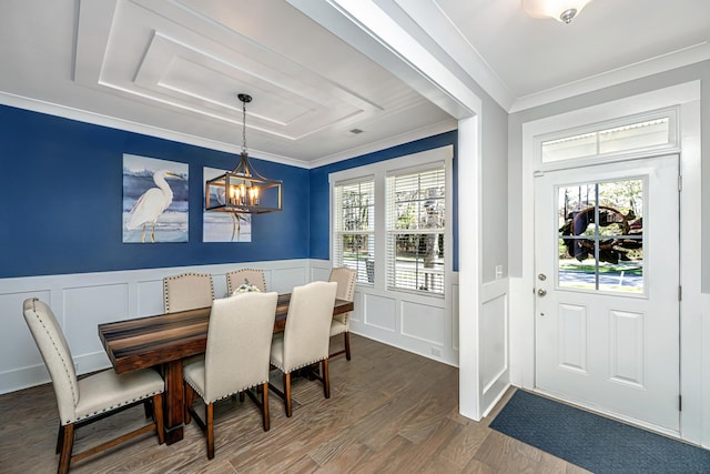 414 Hamlet Cir, Goose Creek, SC 29445 - dining space with a decorative wall, a chandelier, ornamental molding, a wainscoted wall, and plenty of natural light