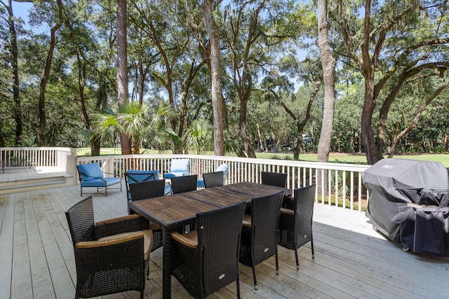 wooden deck with area for grilling