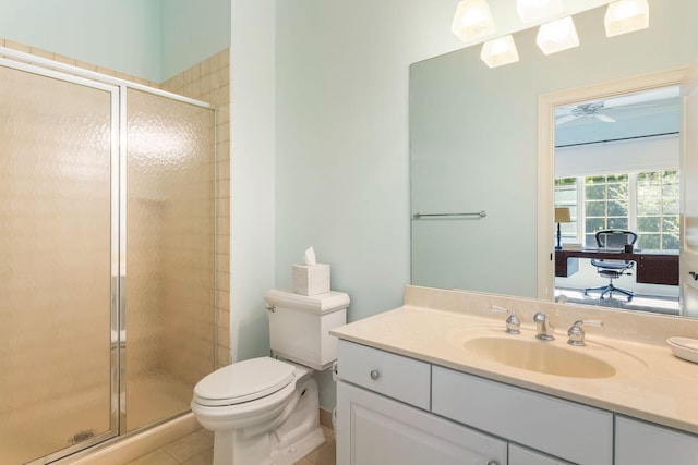 bathroom with an enclosed shower, tile patterned floors, ceiling fan, vanity, and toilet