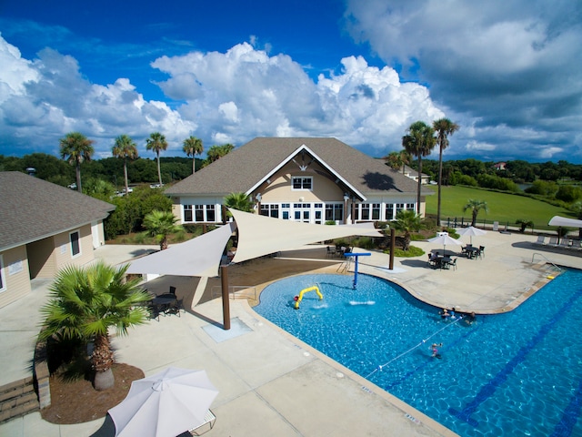 view of swimming pool featuring a patio