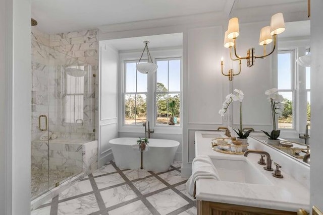 bathroom with vanity, plenty of natural light, and shower with separate bathtub