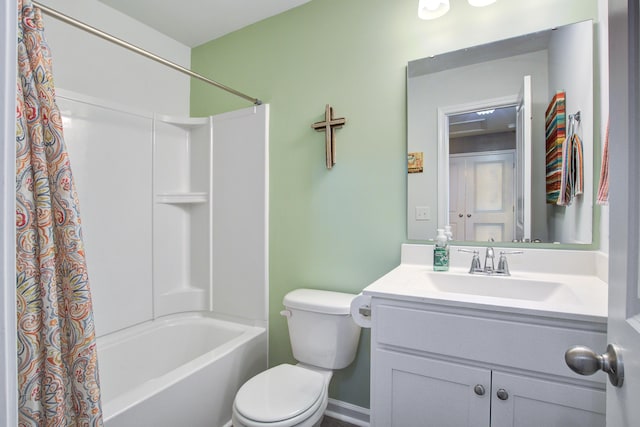 bathroom featuring vanity, shower / bath combination with curtain, and toilet