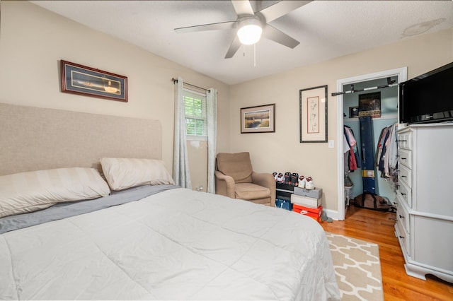 507 Stinson Dr Unit B3, Charleston, SC 29407 - bedroom with a spacious closet, light wood-style floors, a closet, and ceiling fan