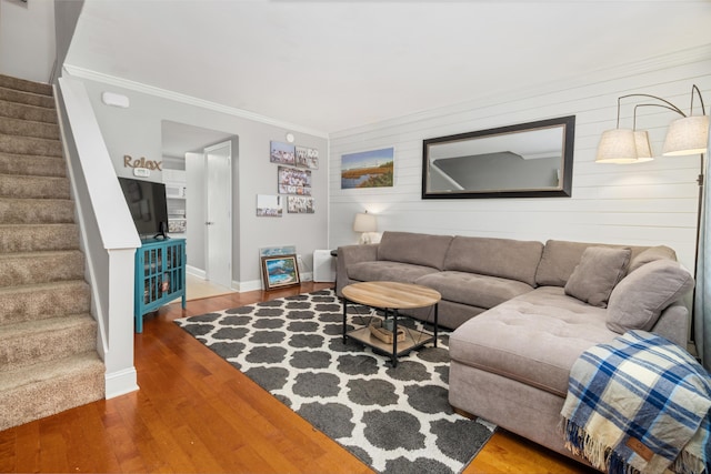 507 Stinson Dr Unit B3, Charleston, SC 29407 - living area with stairs, crown molding, wood finished floors, baseboards, and wooden walls